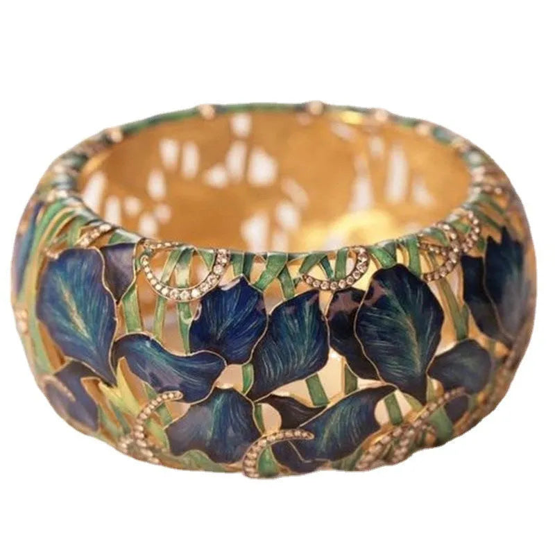 Golden blue oil-plated alloy ring with round sweet cool style on display