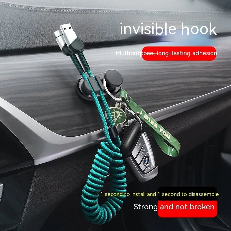 ABS silicone car and indoor cable storage hook in dark green measuring 52mm x 27mm