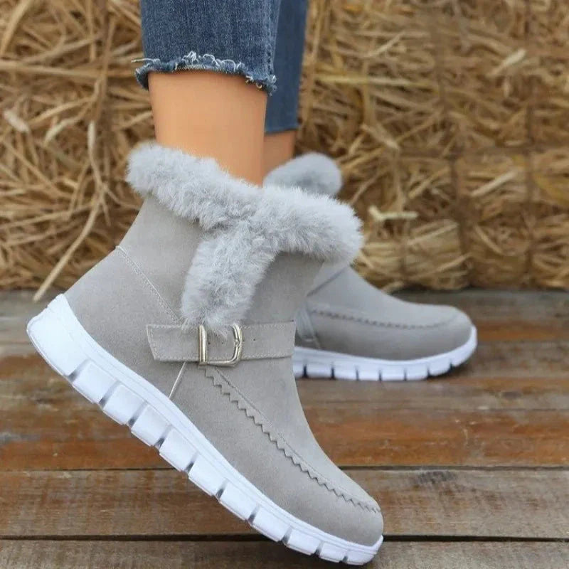 Plush snow boots with suede upper, rubber sole, and artificial fur lining for women's winter wear