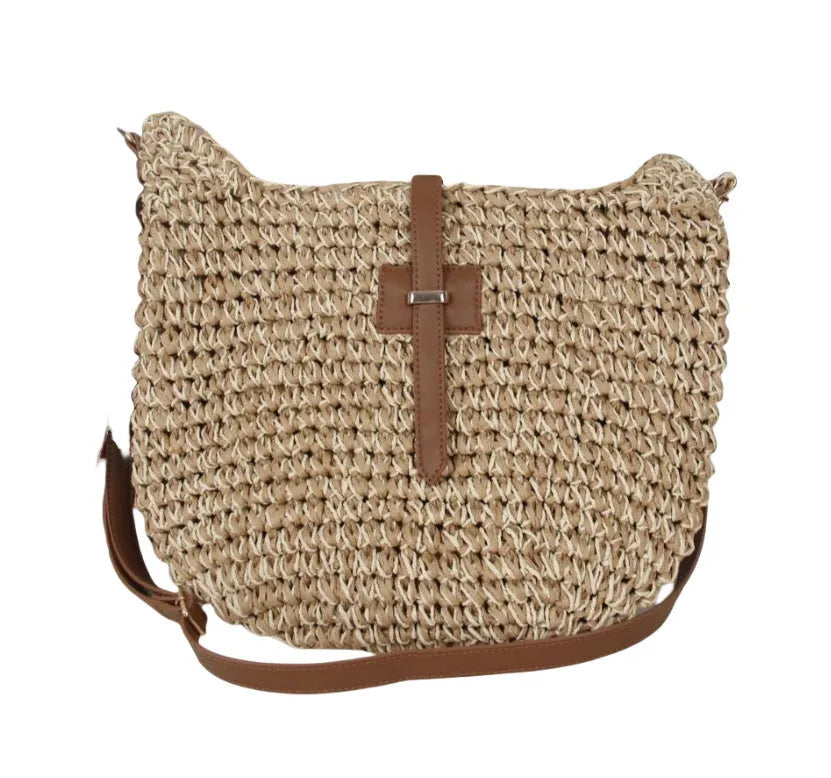 Beige handmade woven bag with a special-interest design and a long shoulder strap.