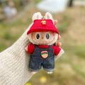 15cm doll clothes pendant in plush fabric, removable and washable, featuring a themed suit design for small dolls