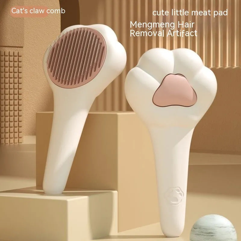 White plastic pet comb with one-click hair removal and massage feature for cat grooming