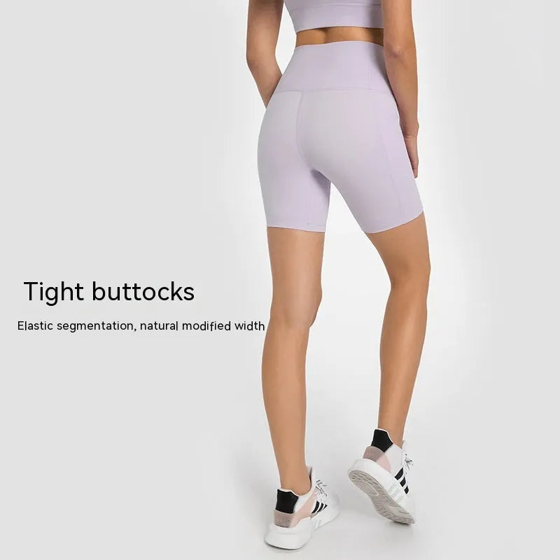 Women's high-waist mid-length sports shorts in black stretch fabric for running and gym