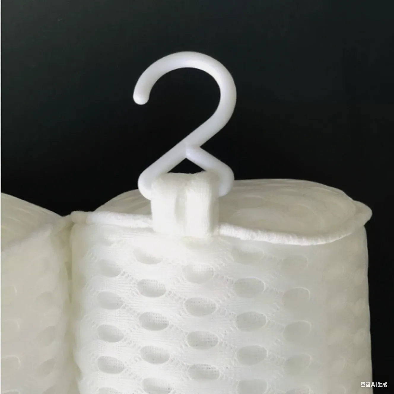 White 4D mesh bathtub pillow with non-slip suction cups, shown on a bathtub.