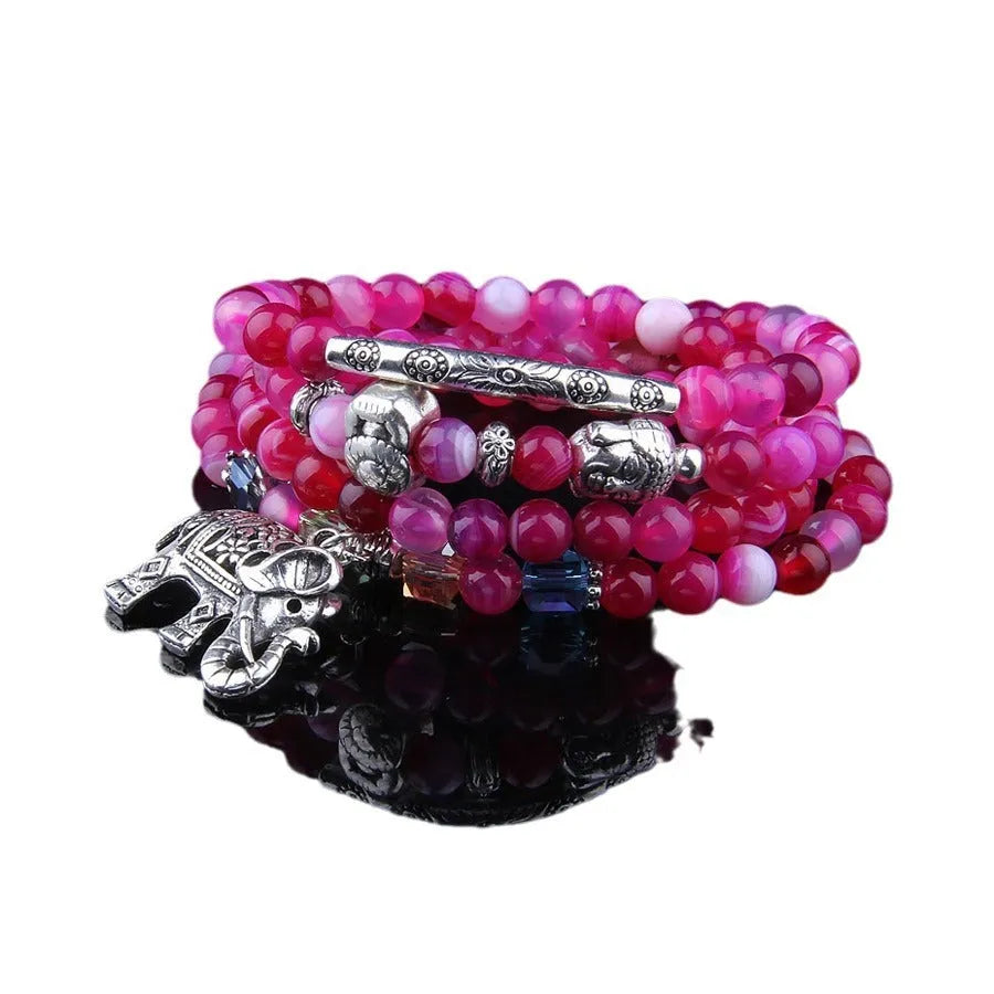 Multi-layer agate bracelet with 6mm beads showing blue elephant pattern on natural crystal stone