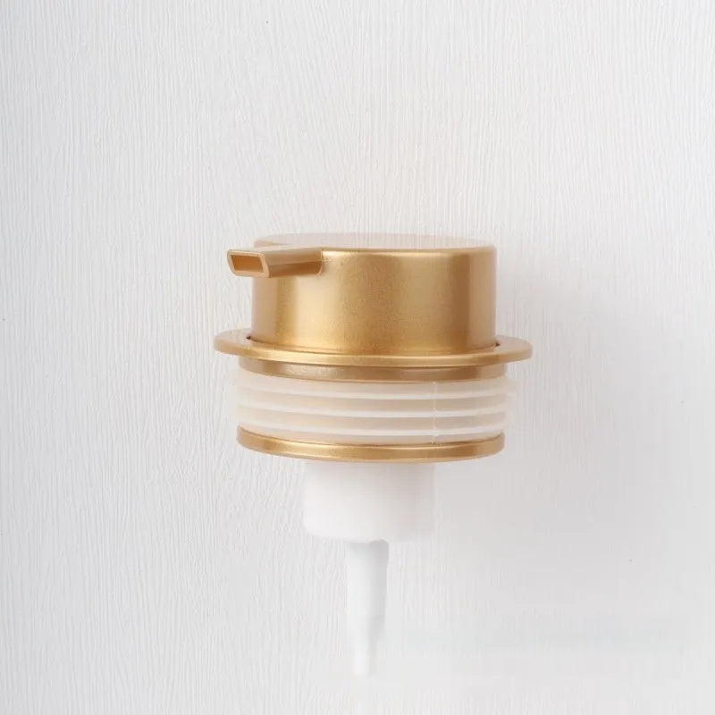 Large pump head facial cleanser foam dispenser in metallic finish