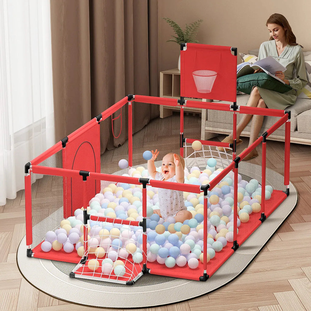 Large grey children's playpen with tent top and stainless steel frame in a living room