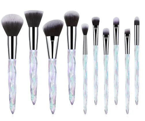 10 clear crystal foundation brushes with diamond shank handles and artificial fibre bristles.