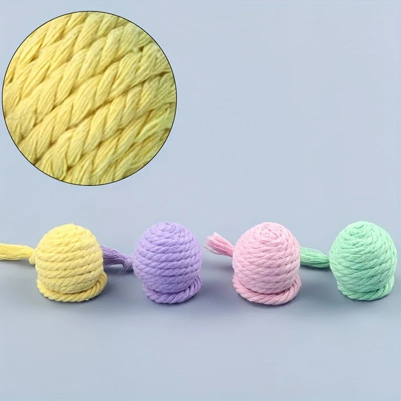 Coloured cat toy ball with rope handle and internal bell in 6cm or 3cm sizes