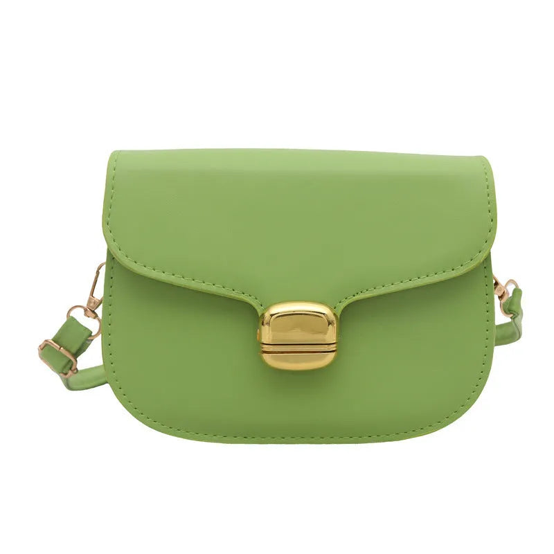 Simple PU leather women's handbag with interior zippered compartment and mobile phone pocket