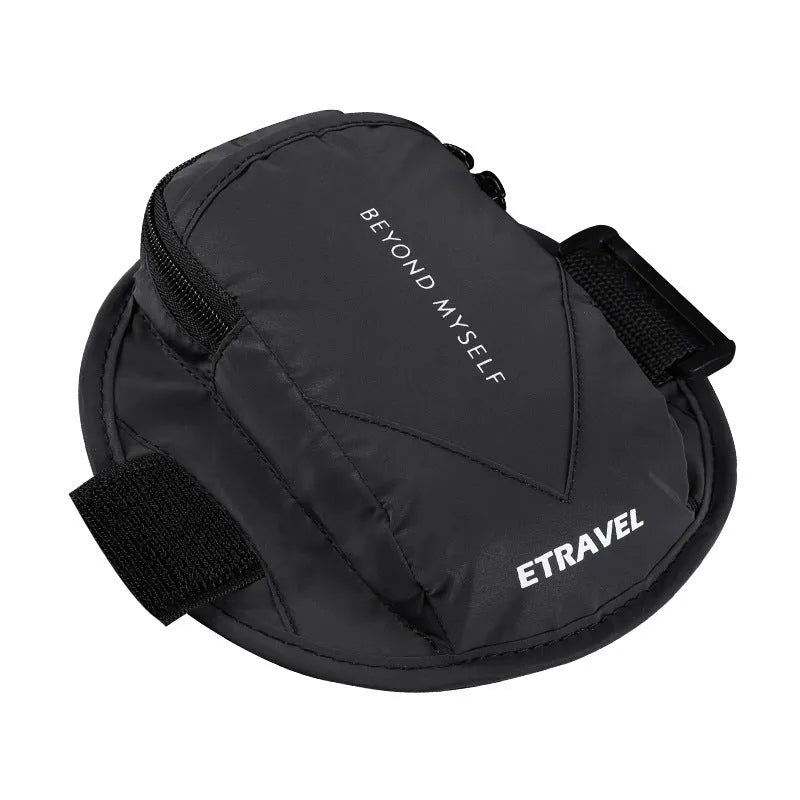 Reflective black running arm bag with adjustable strap shown on an arm.