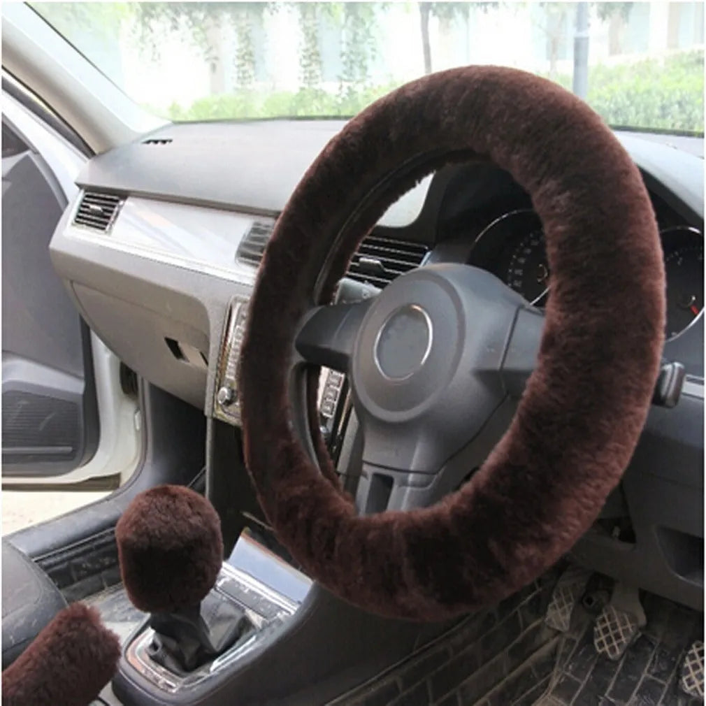 Plush winter car steering wheel cover set in beige, showing steering wheel, handbrake, and gear knob covers
