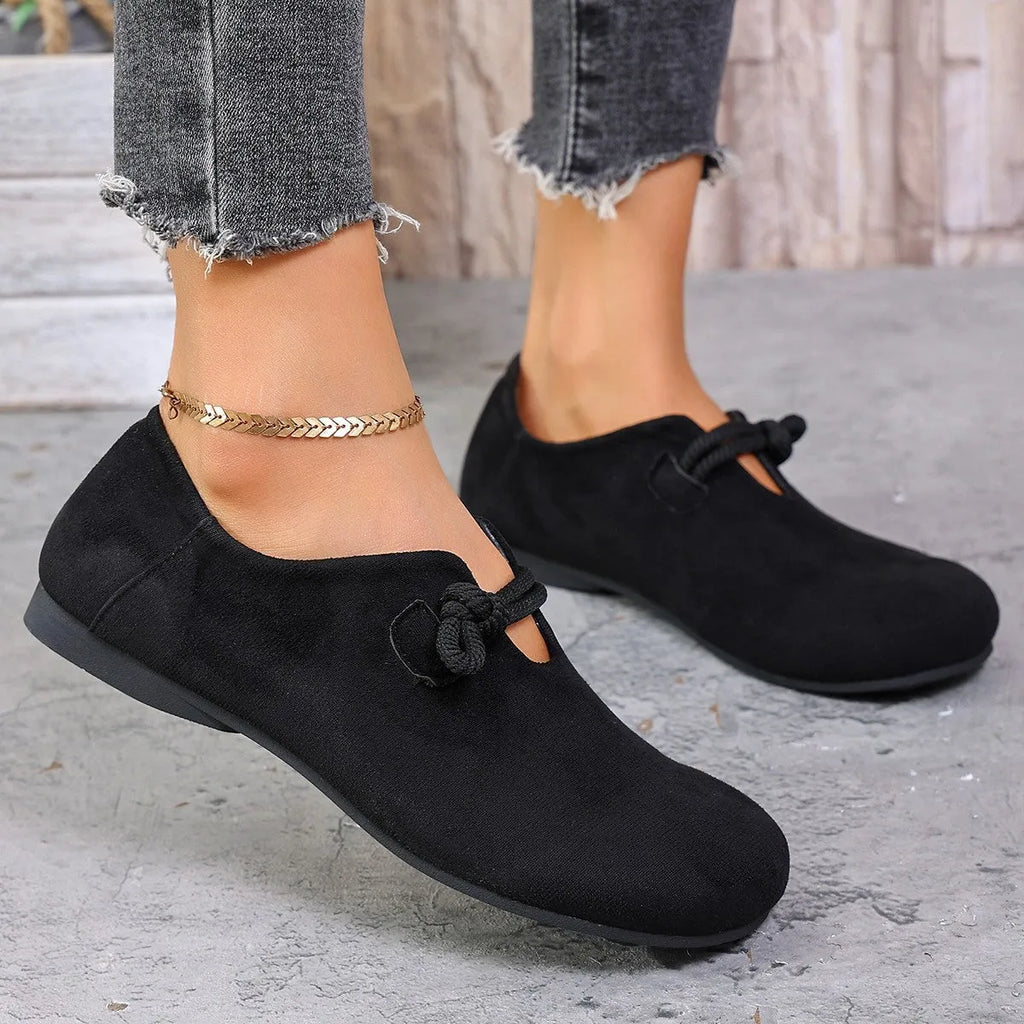 Round head slip-on solid colour flat shoes with suede upper and low rubber sole in beige colour