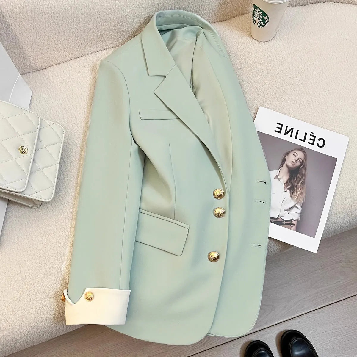 Korean-style women's loose fit coat in milky white colour with pockets