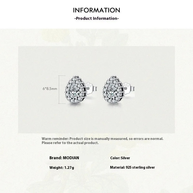 Women's silver drop ear studs with 925 sterling silver construction and diamond treatment finish