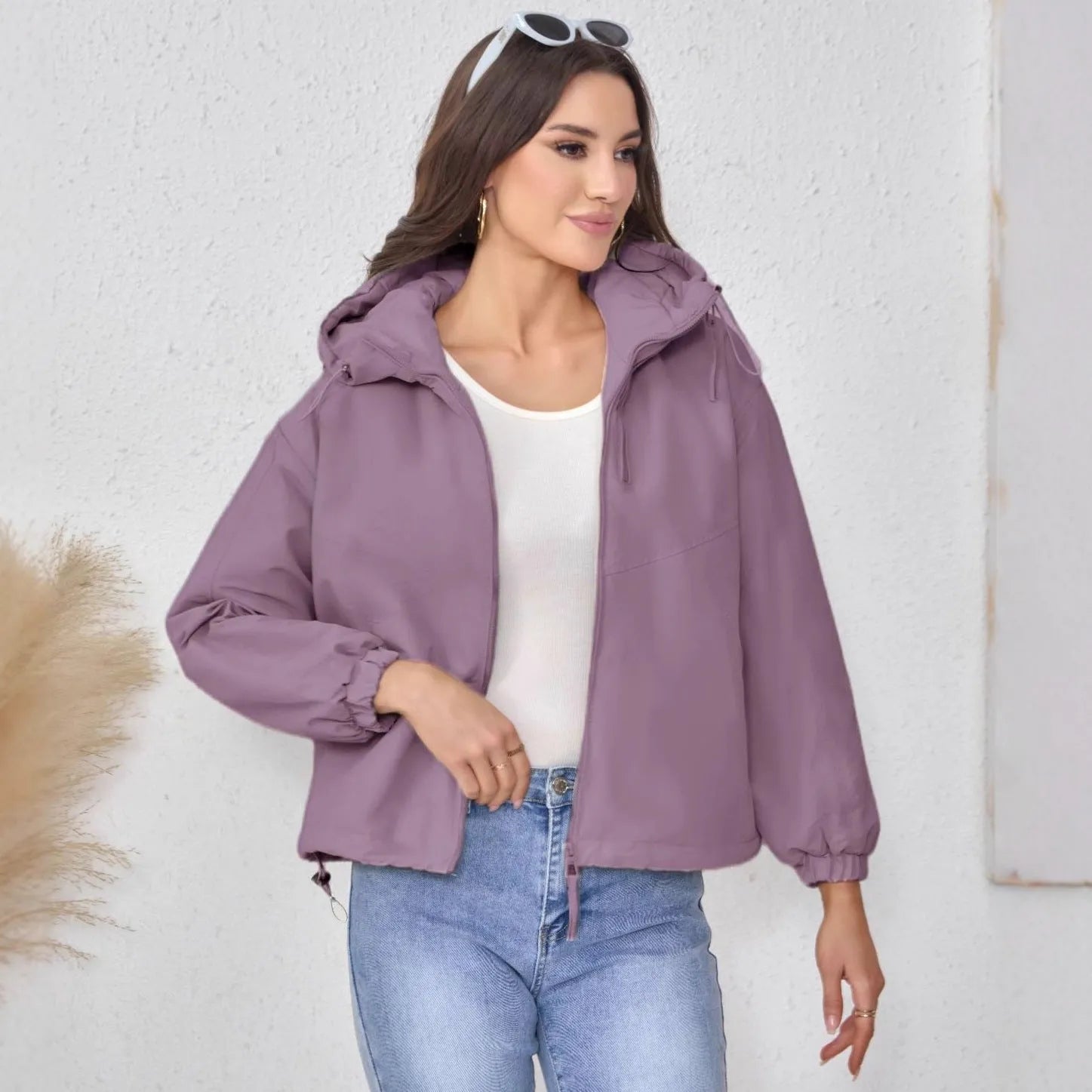 Women's loose fit hooded shell jacket in black, grey, or purple solid colour