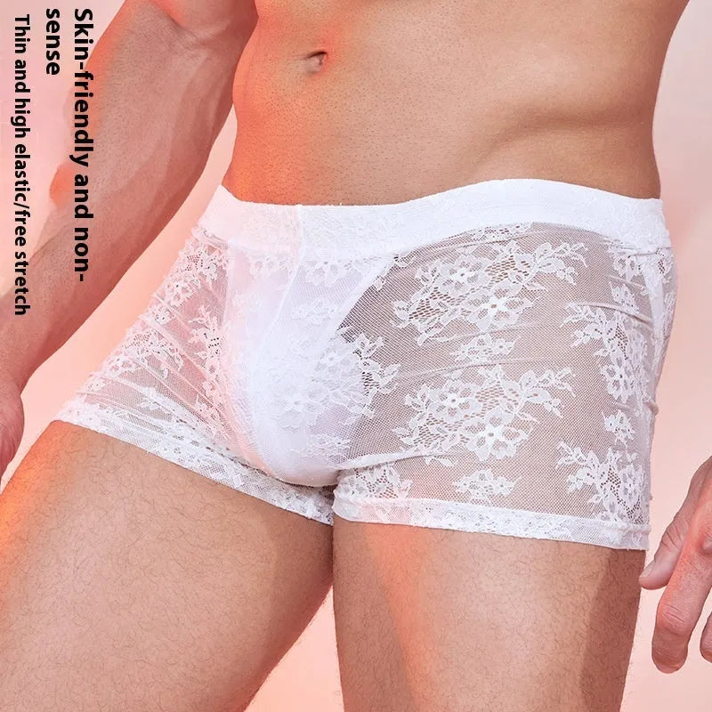 Men's black nylon boxers with white lace detailing on a free size hanger.