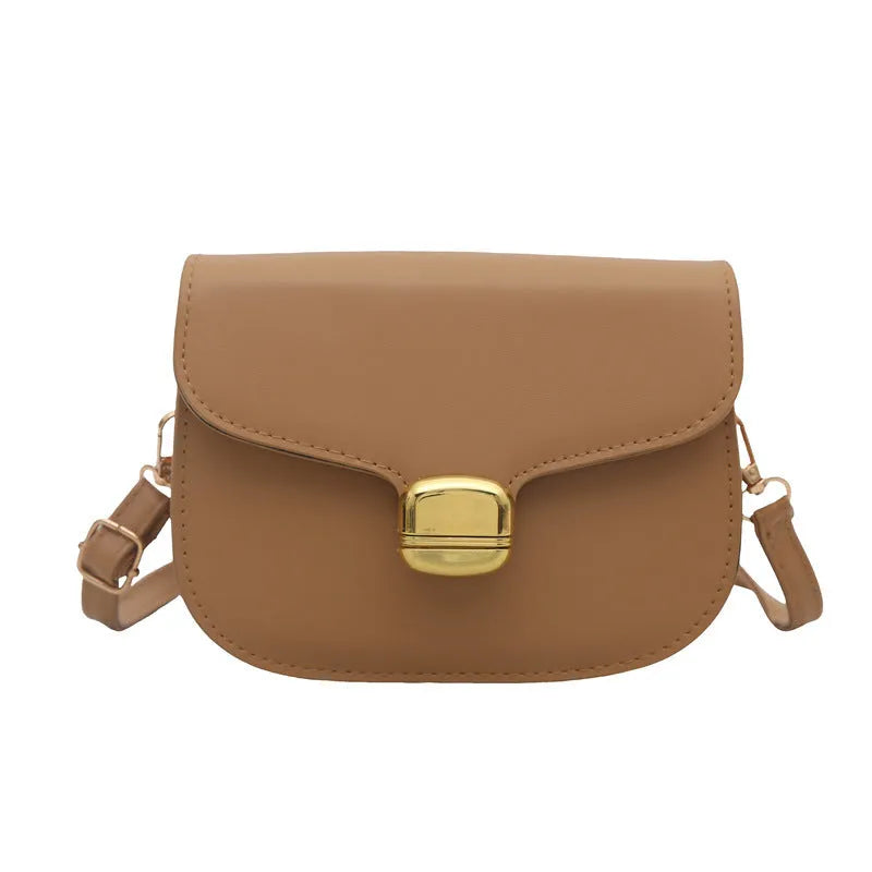 Simple PU leather women's handbag with interior zippered compartment and mobile phone pocket