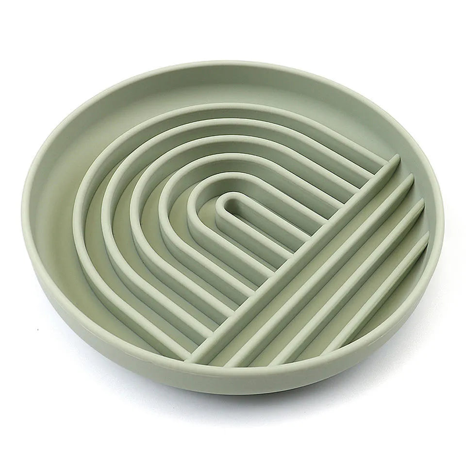 Beige silicone slow feeder dog bowl with ridge pattern for slow eating and lick mat use.