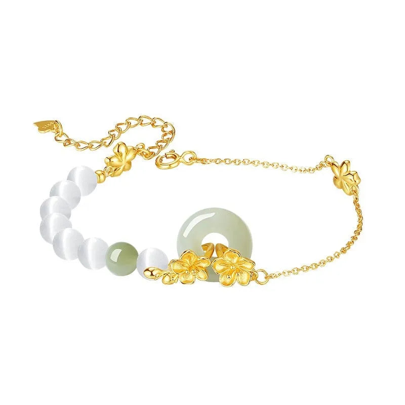 Pure silver women's bracelet with peach blossom design and safety buckle closure in white gold colour