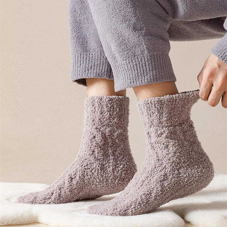 Cozy coral fleece socks in various colors, featuring soft velvet material and anti-slip design for comfort and warmth.