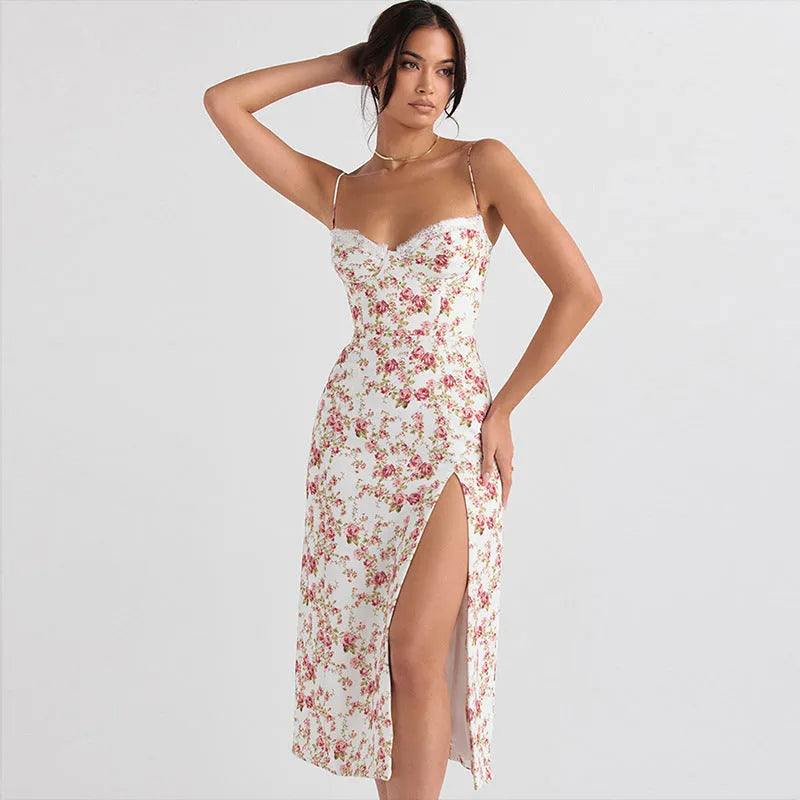 Women's floral lace print long dress with suspender straps and a thigh slit, shown in blue.