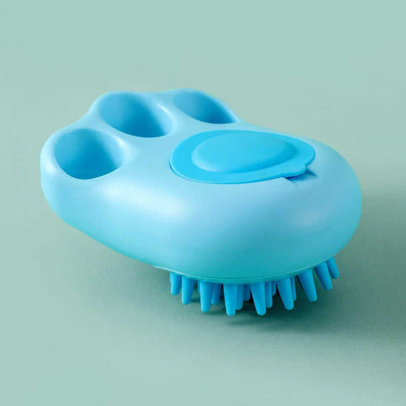 Claw-shaped pet grooming brush in pink, blue, yellow, and grey for cats and dogs