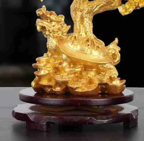Citrine-coloured resin turtle money tree ornament with Chinese design style.