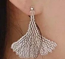 Handmade glass beaded earrings in leaf shape with clear coloured glaze finish and tulip motif