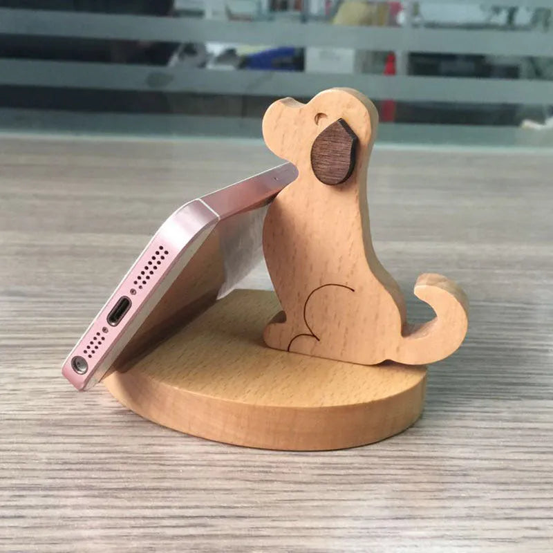 Beech wood and resin lazy phone holder bracket with decorative animal design holding a mobile phone.