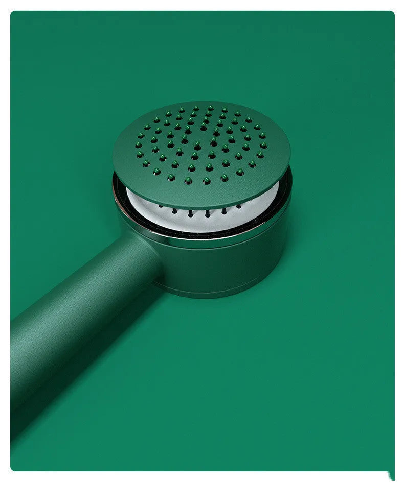 Long handle air cushion comb in green with plastic body for hair styling