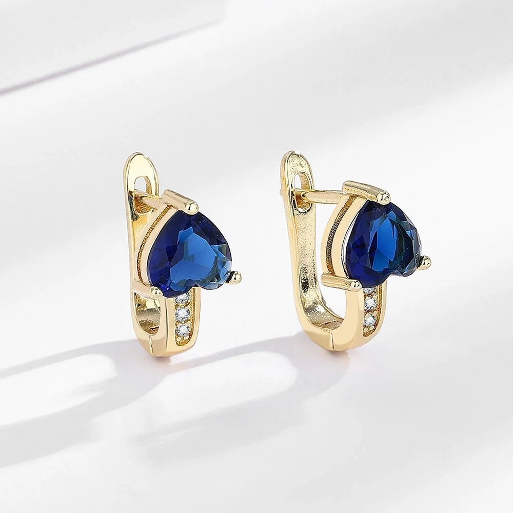 Loving Heart Zircon Ear Clips in white gold and yellow gold with diamond accents