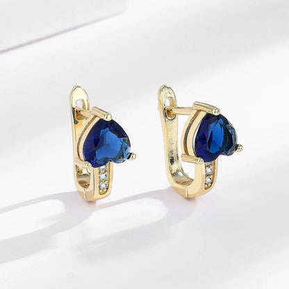 Loving Heart Zircon Ear Clips in white gold and yellow gold with diamond accents