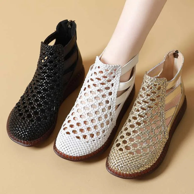 Gold and white women's flat sandals with hollow-out PU upper and soft TPR sole.