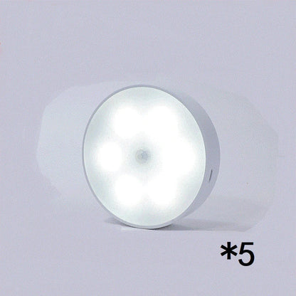 USB rechargeable motion sensor LED puck light for cabinets and night use