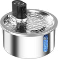 Stainless steel heated pet water fountain on a white base with a charging cable.