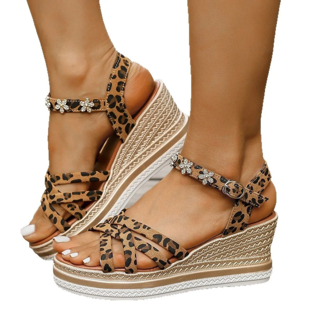Light brown suede platform sandals with adjustable ankle buckle and open toe design