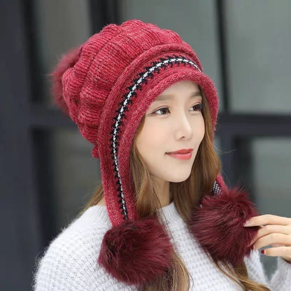 Knit fleece beanie with ear flaps and pompom in various colours for winter warmth