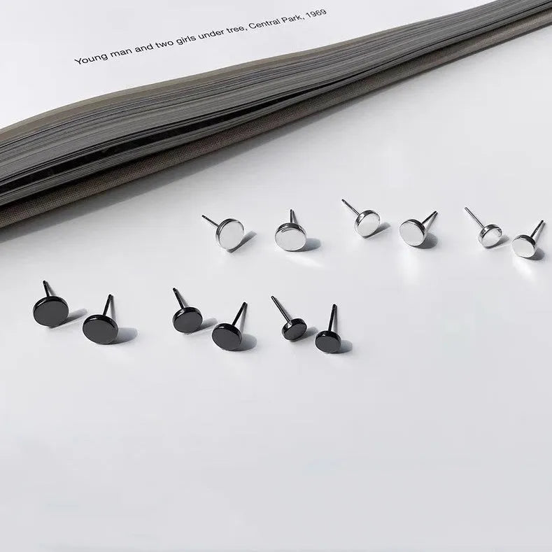 S999 sterling silver flat ear bone studs in geometric round design, showing silver and black colour options