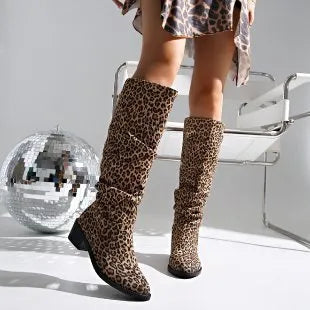 Brown leopard print women's boots with a square toe and chunky mid heel.