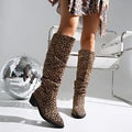 Brown leopard print women's boots with a square toe and chunky mid heel.