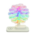 Spiral Tree geometric modern LED desk lamp with white light on a wooden surface.