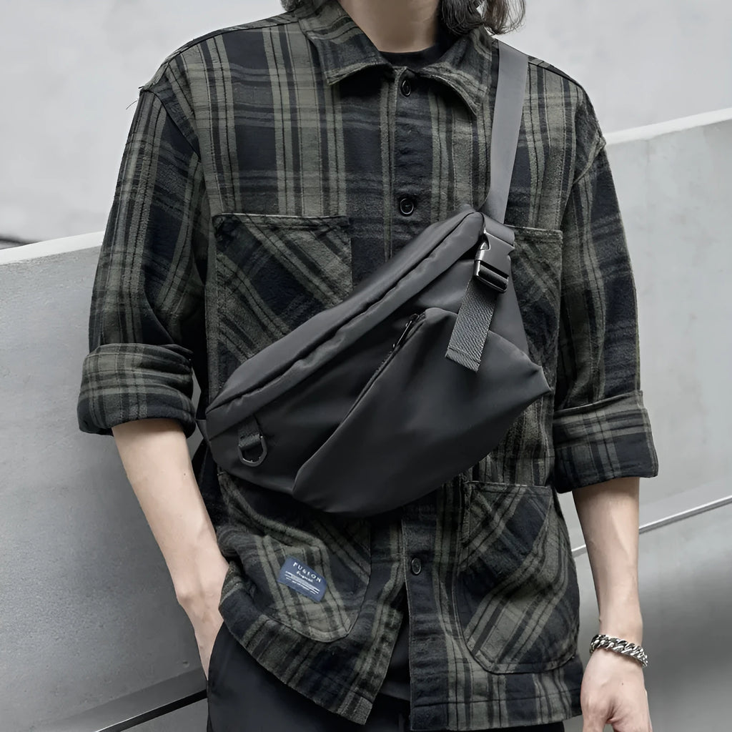 Black men's slanted chest bag with 8-inch Oxford fabric construction and sewing line detail