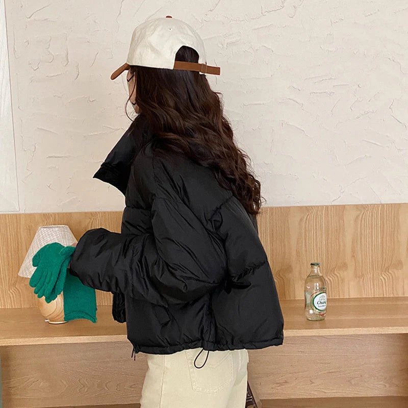 Stand collar short cotton-padded coat for women in slim fit design, available in four colours