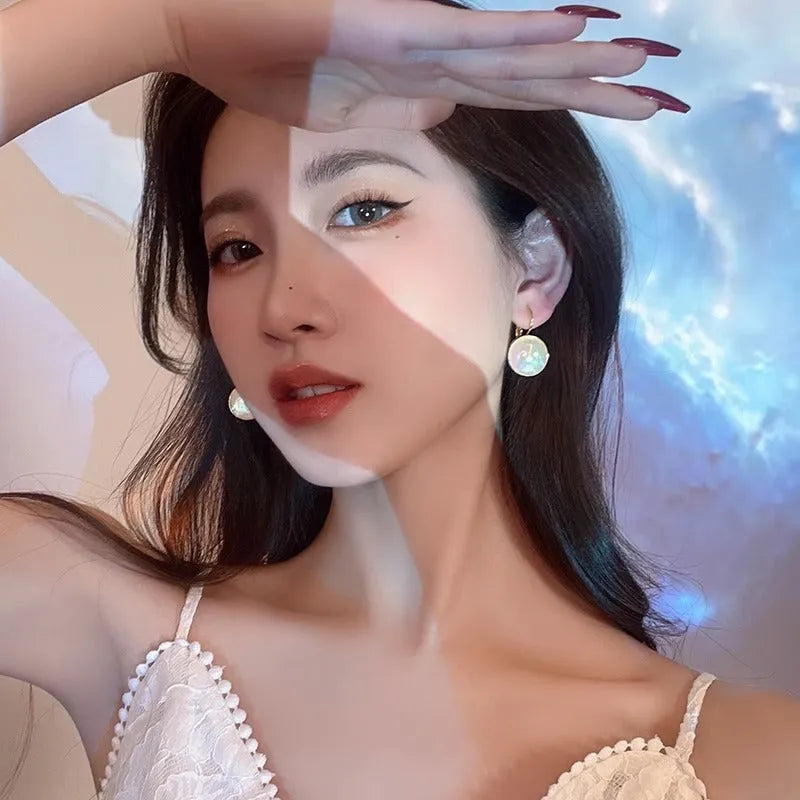 Colourful mermaid pearl finish geometric round ear clips with an anti-lost design for women.