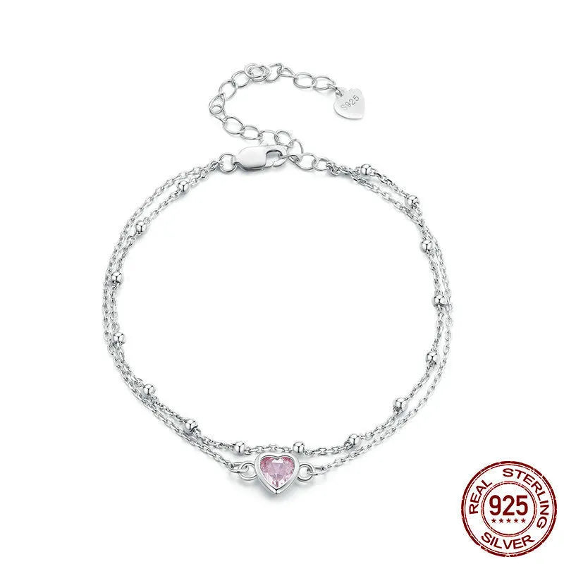 Women's sweet style sterling silver 925 bracelet with small heart-shaped charm on an adjustable chain.