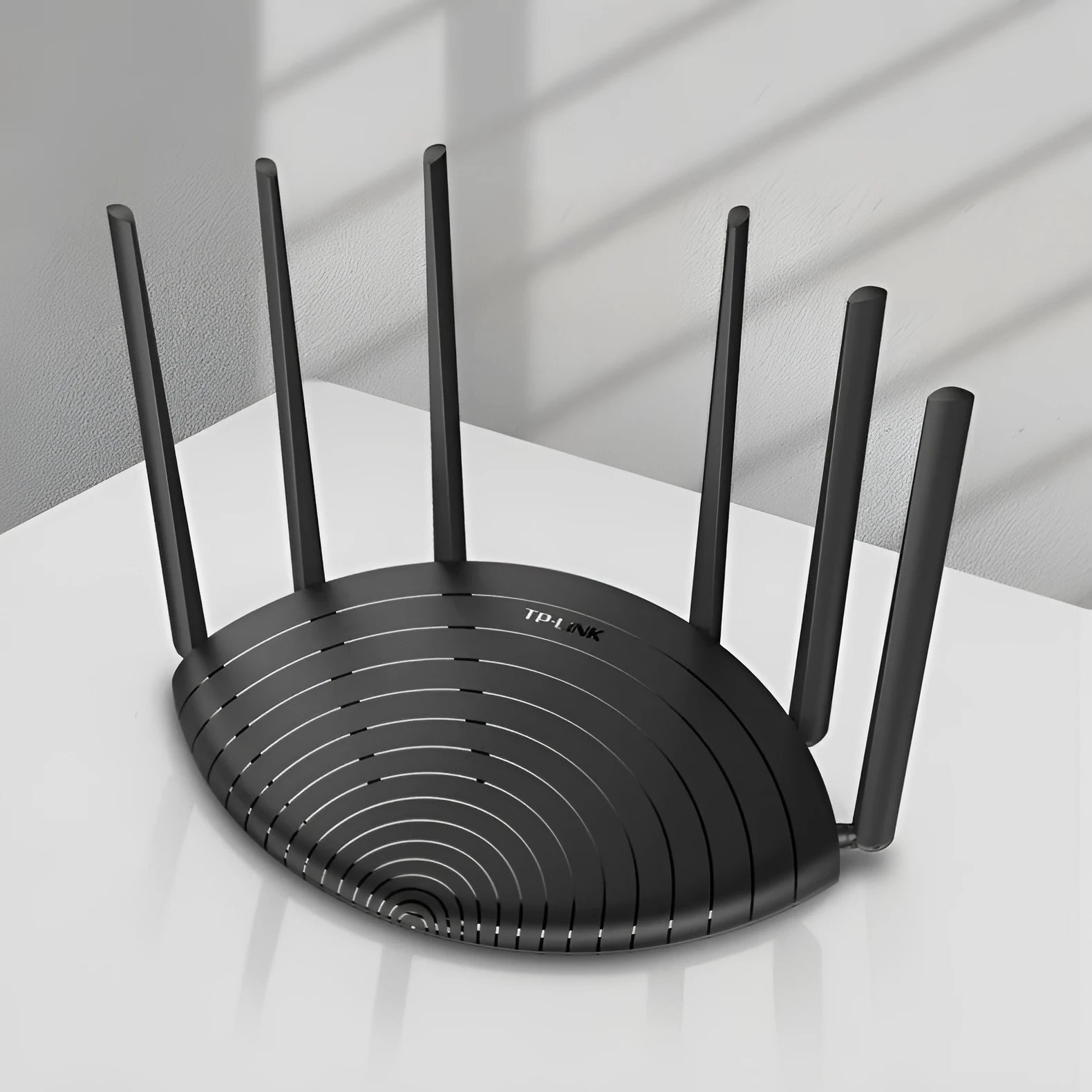 AC1900 Gigabit wireless router with display panel showing connection status indicators