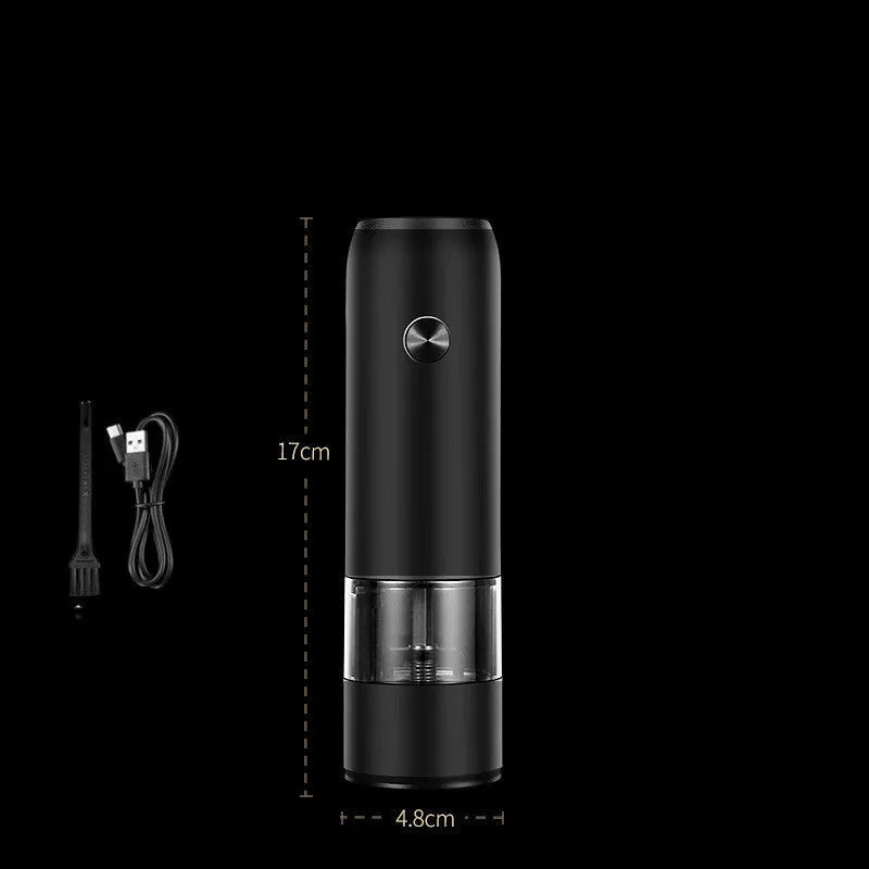Black and white rechargeable electric pepper and salt grinders with clear acrylic bodies on a kitchen counter.