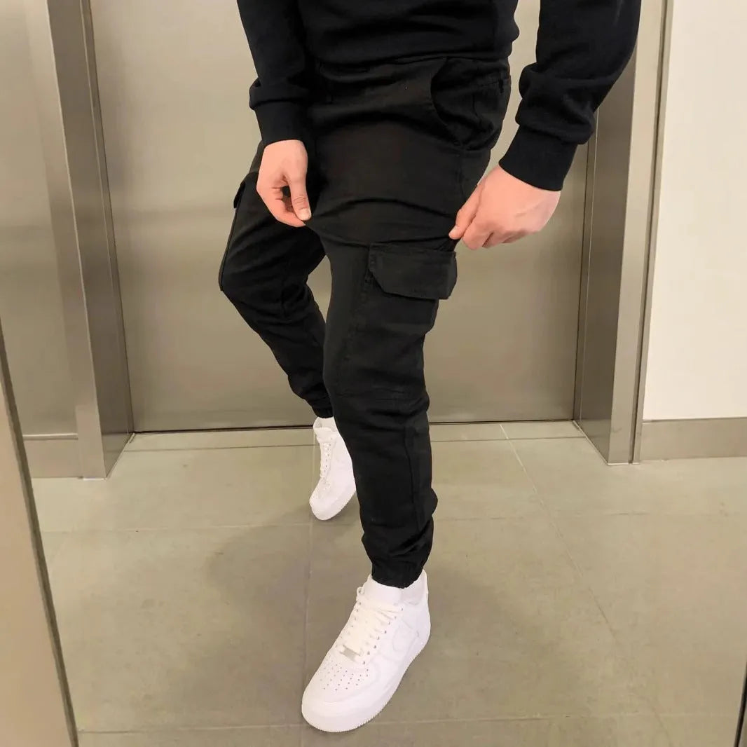 Men's casual baggy trousers with dimensional patch pockets and elastic waist in light blue colour