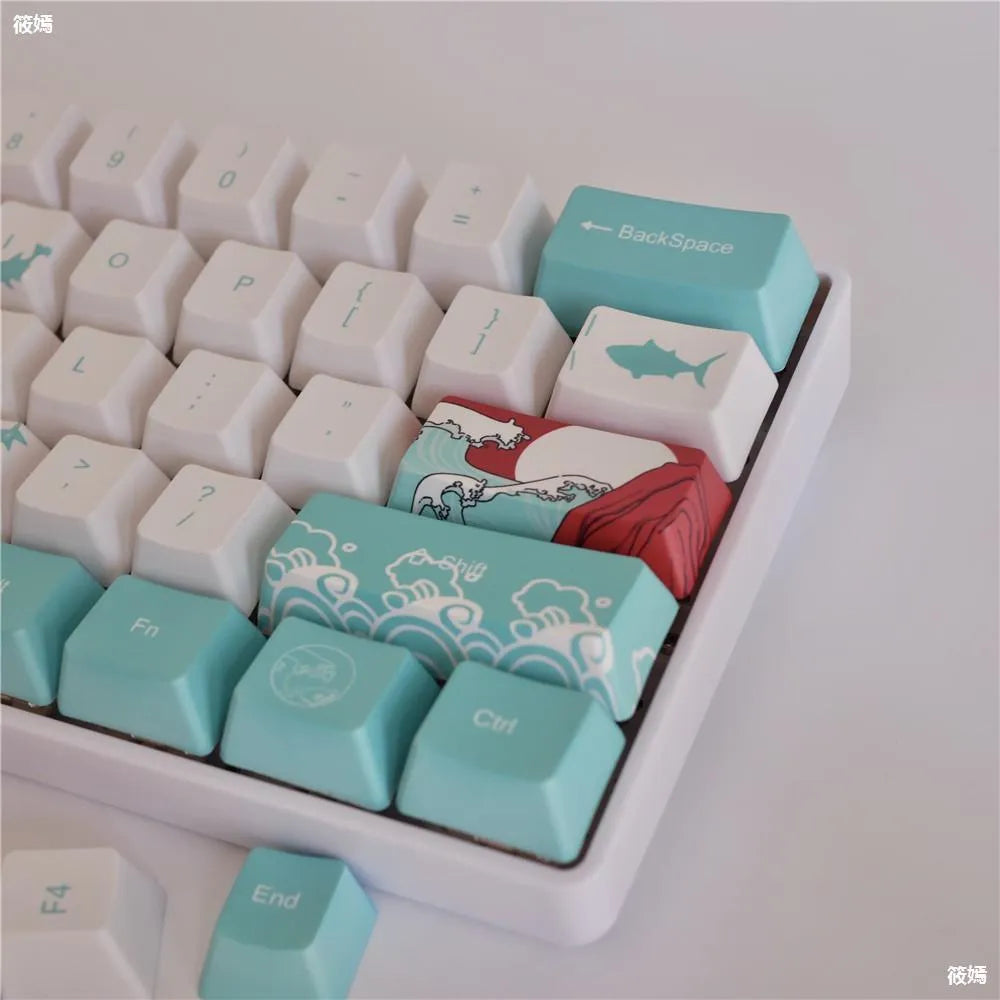 Coral Sea themed PBT plastic keycap set for mechanical keyboards, showing 104 colourful keys.